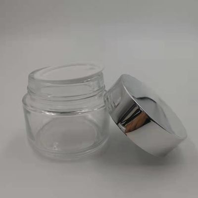 MSDS 투명 100g 유리 크림 항아리 빛나는 은색 캡 흰색 뚜껑 마스크 진흙